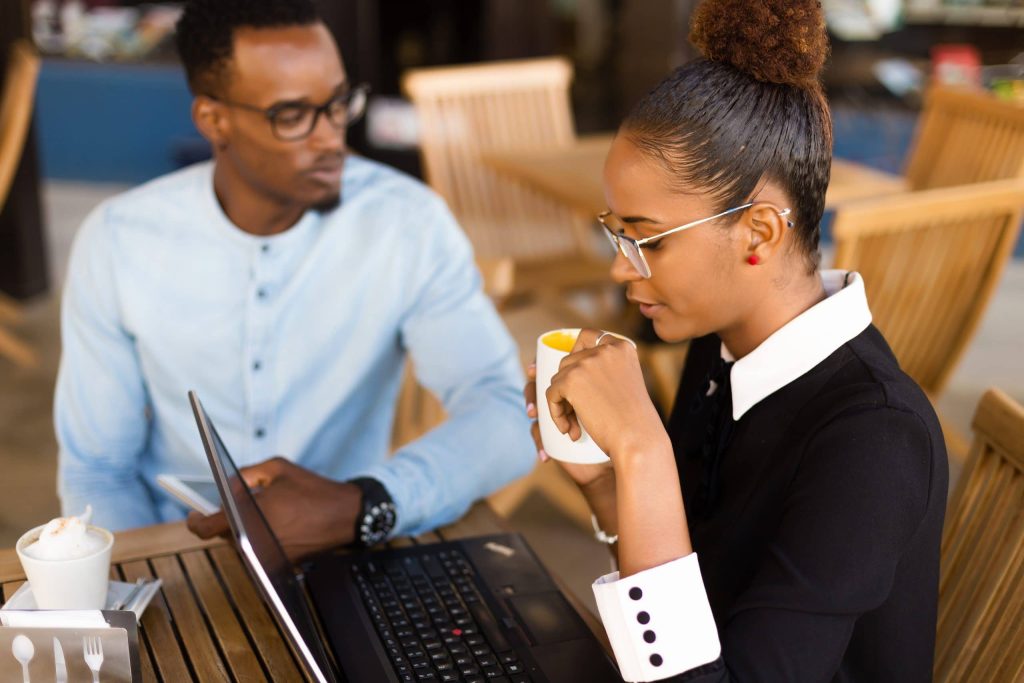 Black African American Coworkers Doing Digital Tea H8y7us4 1 Scaled