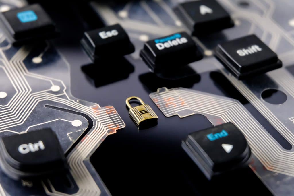 keyboard parts with a lock, symbolizing the role of ethical hackers
