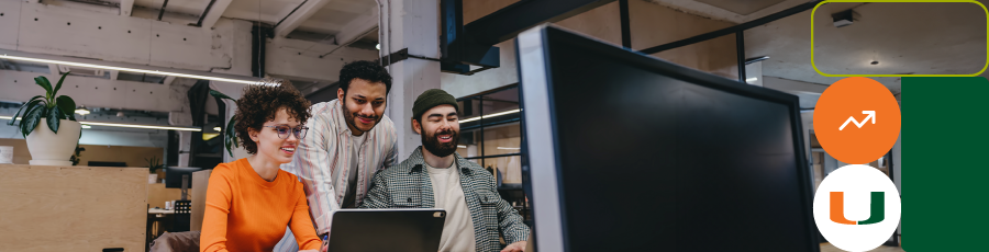 "Three people collaborating around a laptop in a modern office setting."